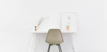 White work desk paired with Nordic chair