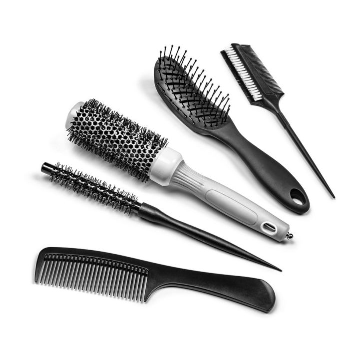 set of professional hairbrushes on white background