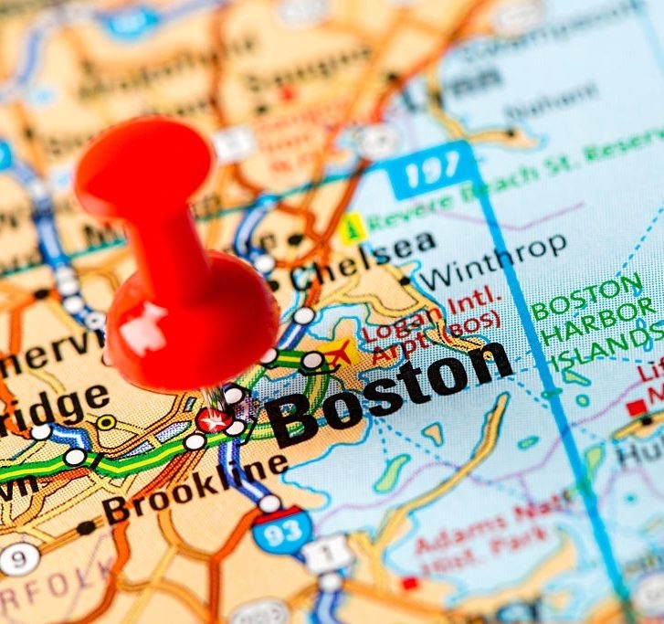 Boston map with red pin on it