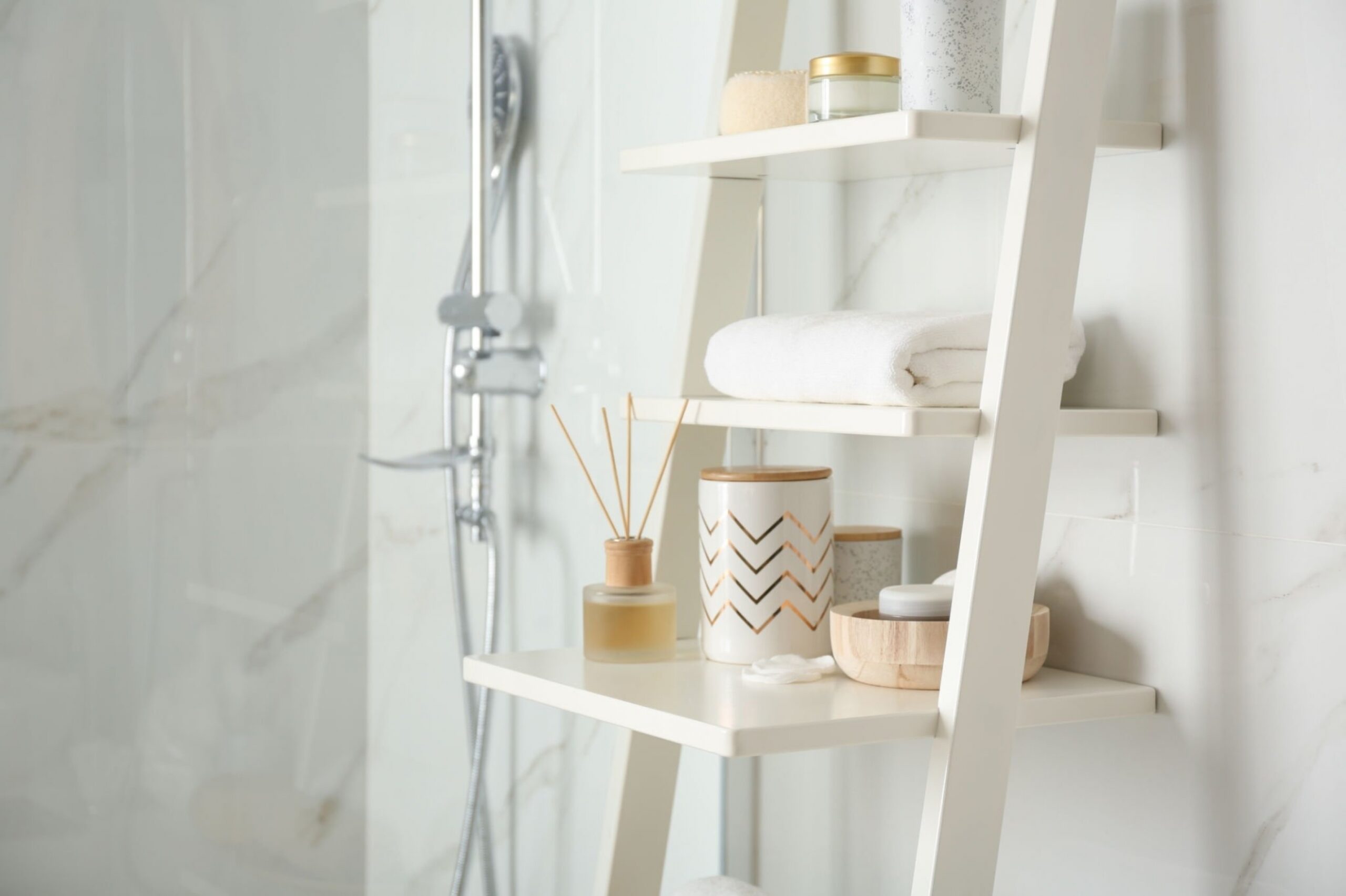 Shelving unit with different items in bathroom