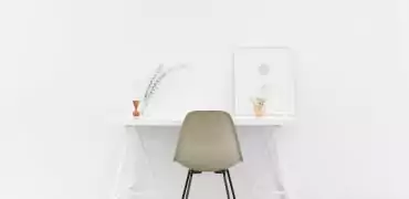 White work desk paired with Nordic chair