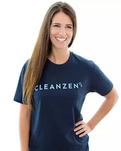 Model wearing navy shirt with Cleanzen logo in white background
