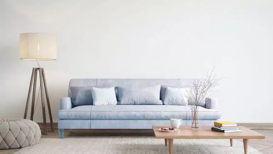 Cozy living space with fancy blue couch