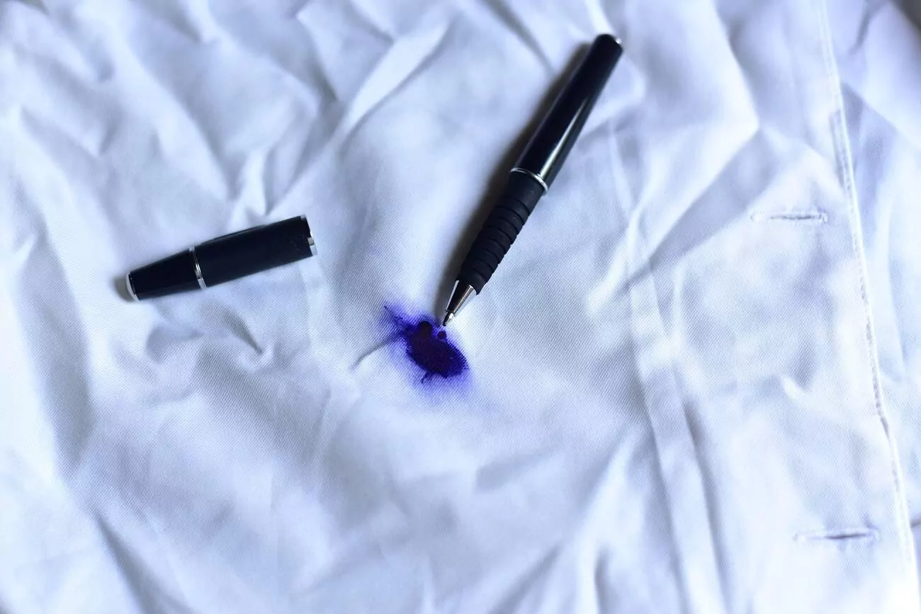 Your Ultimate Guide on How to Get Ink Out of Clothes Cleanzen Image of Pen Ink Stain on Fabric