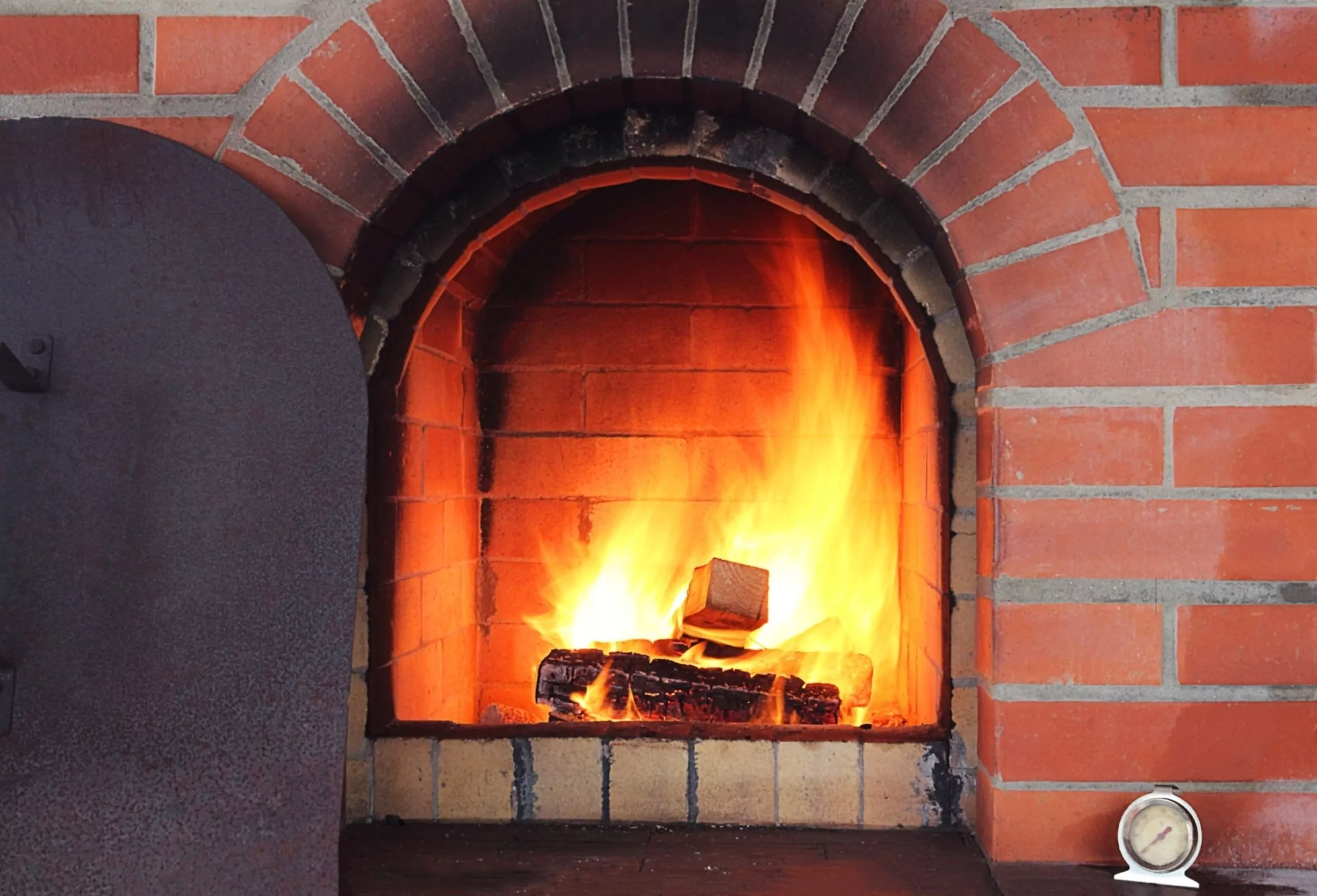 How to Clean Brick Fireplace Cleanzen Image of a Fireplace with Soot Stains