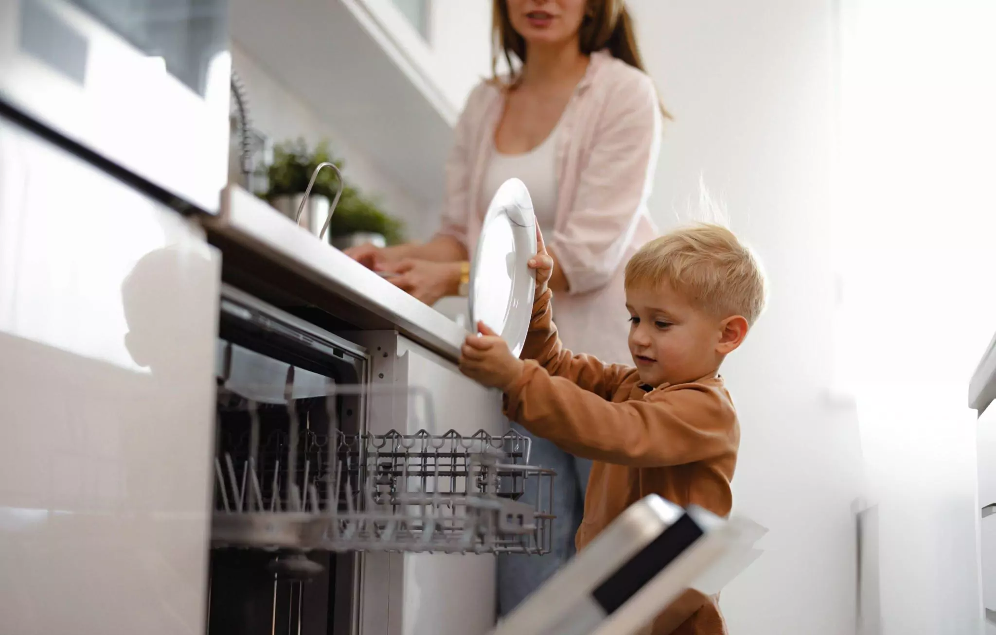 Kitchen Cleaning Checklist Cleanzen Image of Mother and Son Doing the Dishes