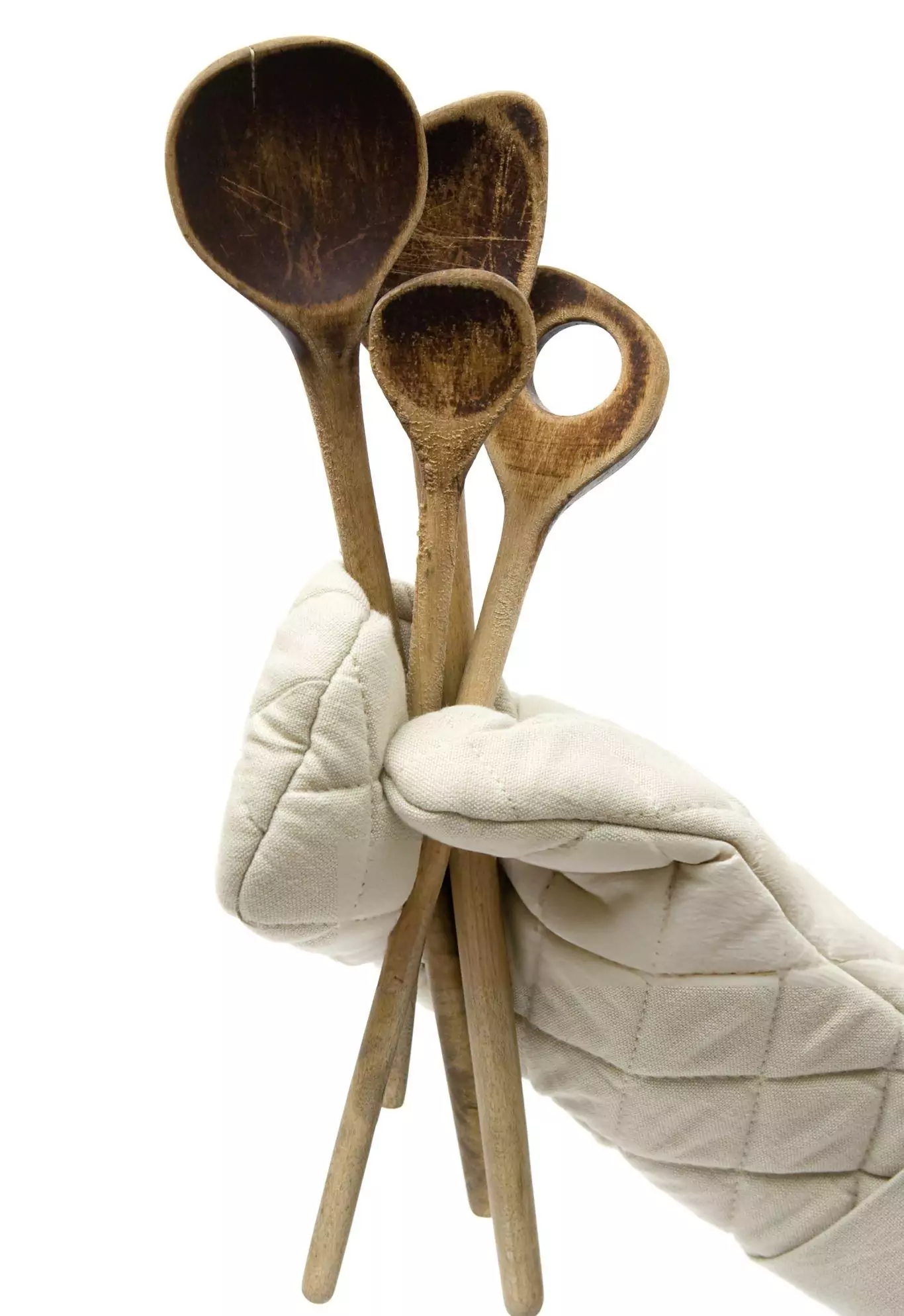 How to Clean Wooden Spoons Cleanzen Image of a Gloved Hand Holding Various Used Wooden Spoons