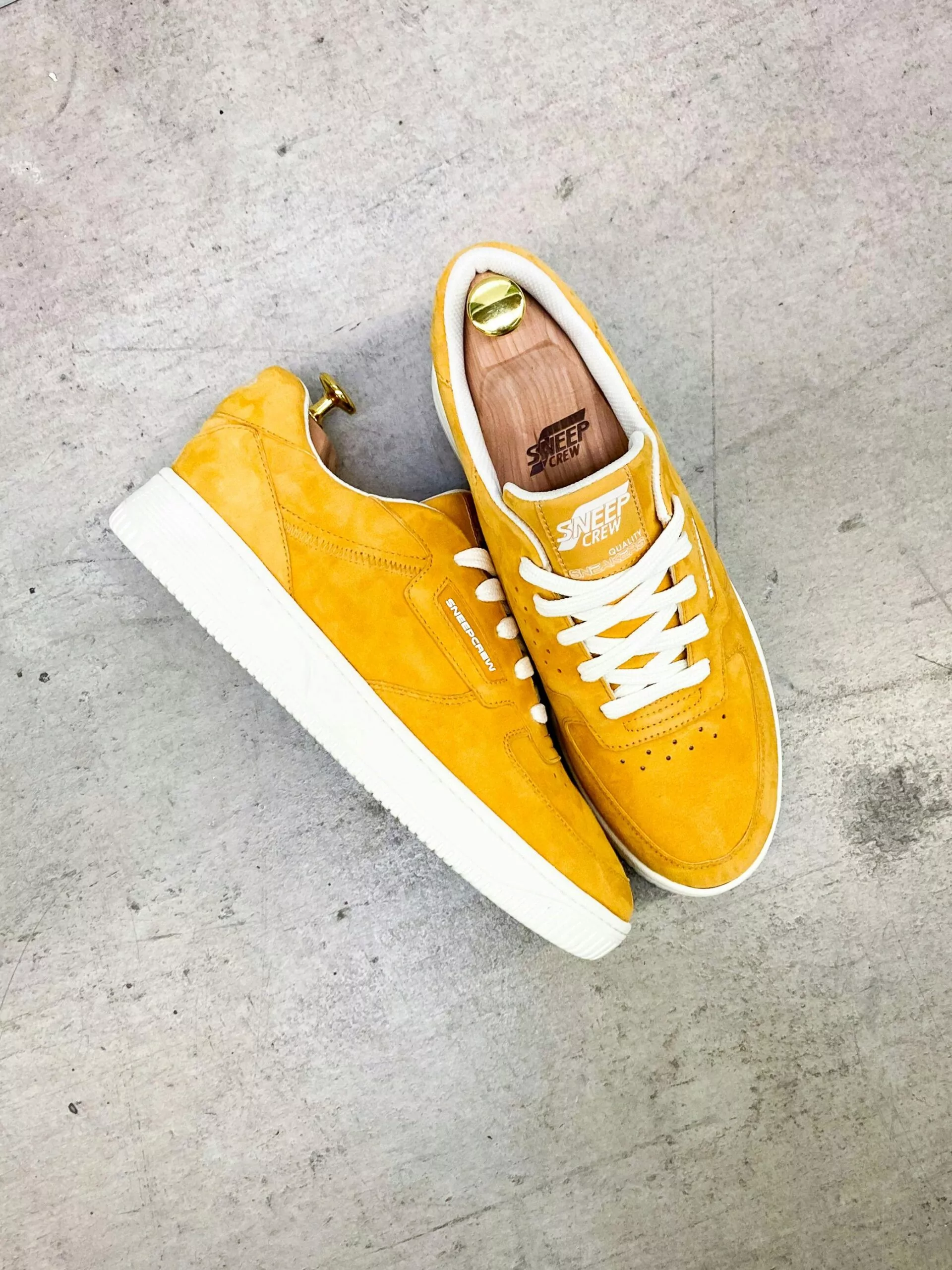 How to Clean Suede Shoes Cleanzen Image of a Yellow Suede Sneakers