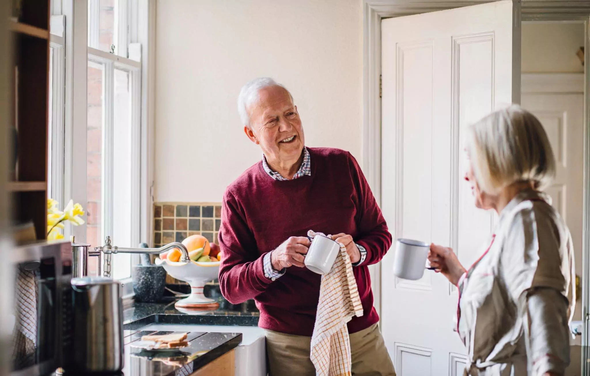 Ways to Help Make Cleaning Easier for Seniors Cleanzen Image of Two Seniors Tackling Household Chores