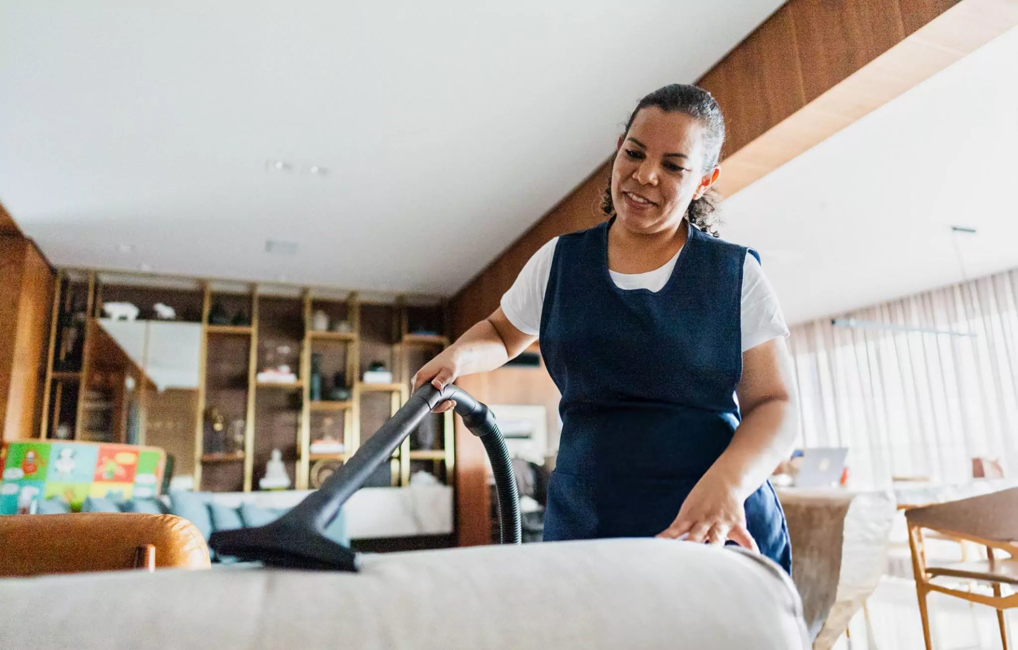 Ways to Help Make Cleaning Easier for Seniors Cleanzen Image of a Housecleaner Doing Housekeeping