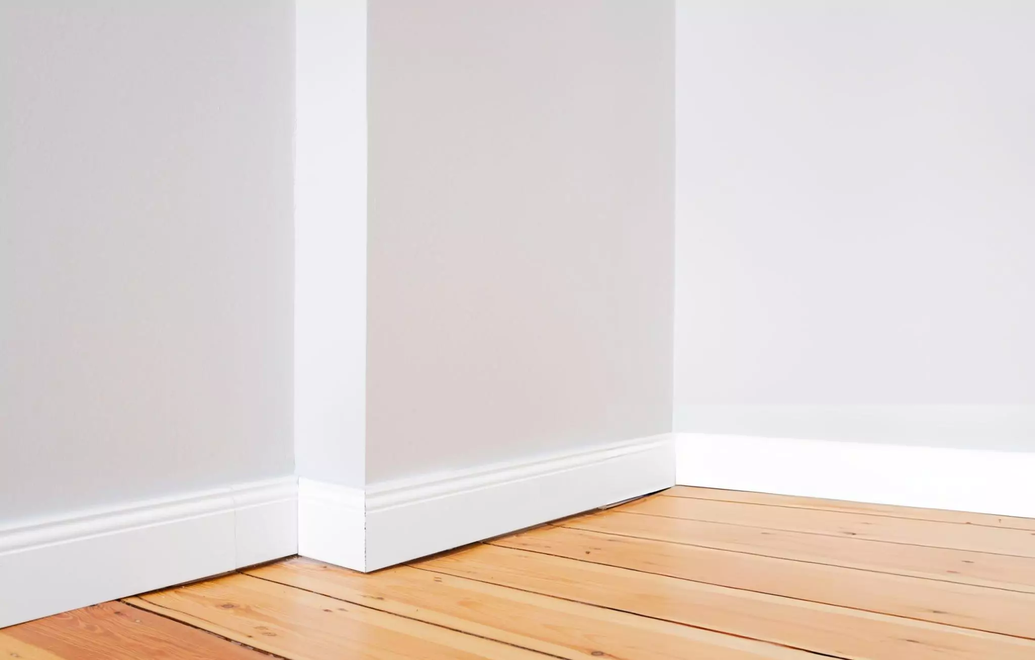 Most Overlooked Places to Clean in Your Home Cleanzen Image of a Wooden Floor and Painted Walls
