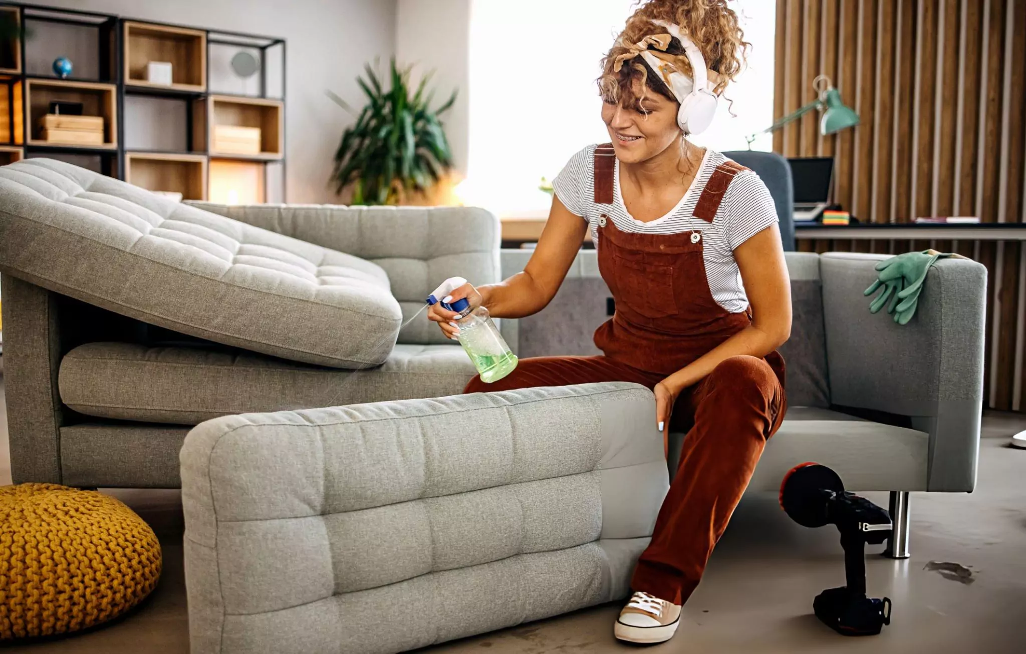 How to Clean a Couch Cleanzen Image of a Woman Deep Cleaning Sofa