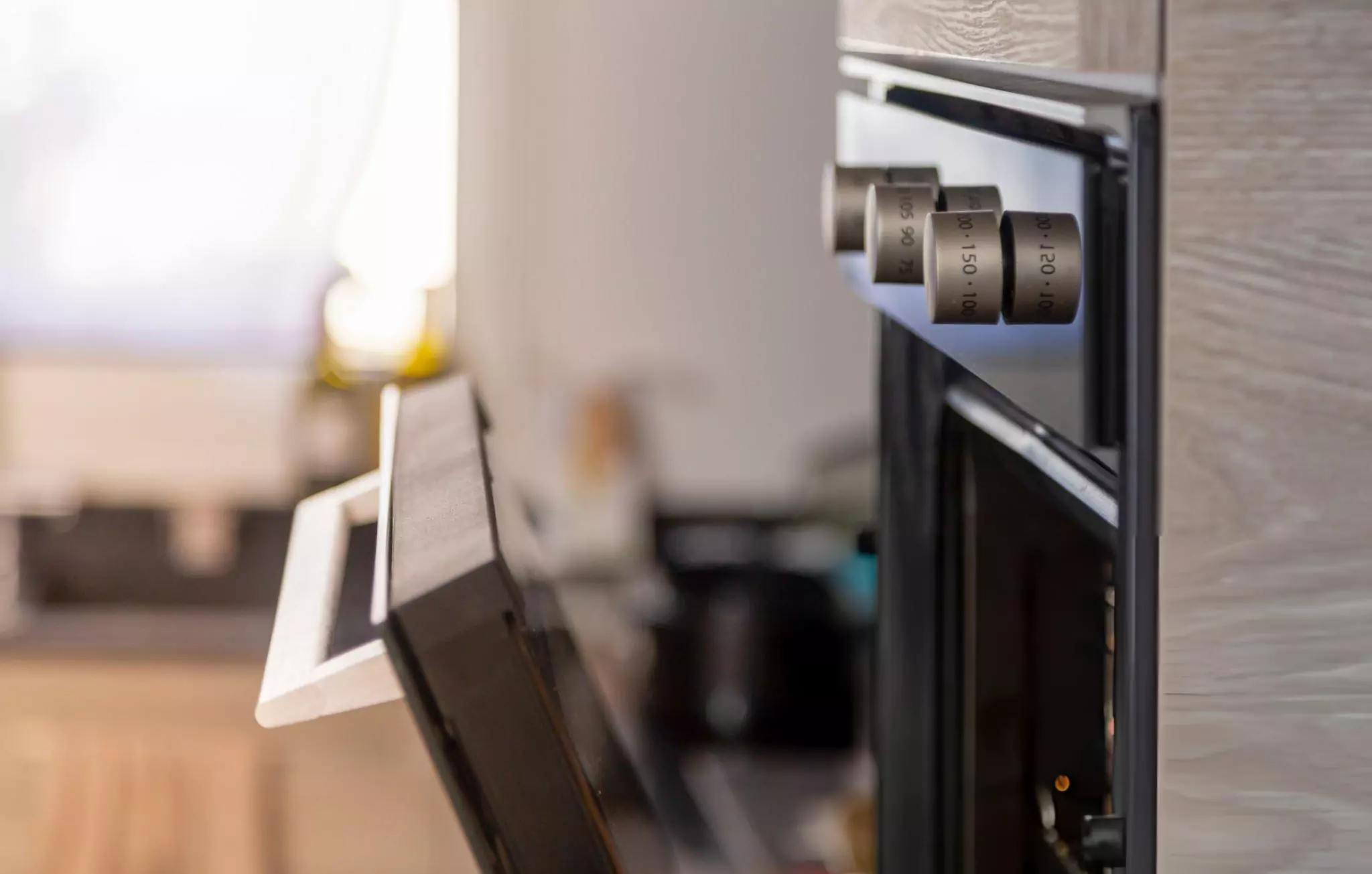Self Cleaning Oven Cleanzen Image of an Opened Oven Door